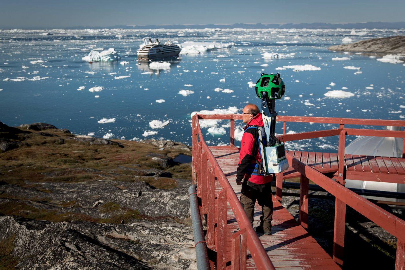The Google Street View trekker at work near Hotel Arctic in Ilulissat in Greenland. By Mads Pihl