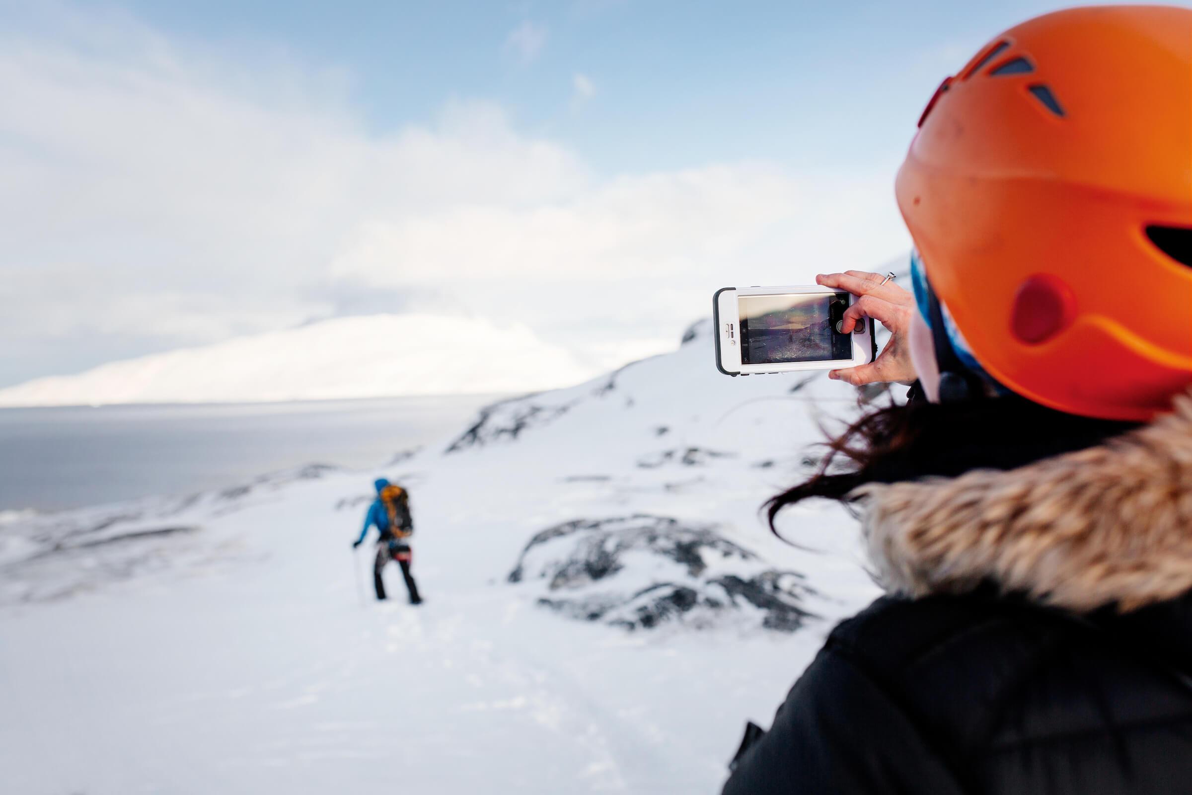 Tourist taking a photo of Marc Carreras in back-country Nuuk in Greenland. By Rebecca Gustafsson