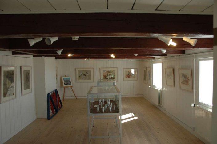 Exhibition of paintings by Gitz Johansen and figures by Otto Thomassen. Photo by Upernavik Museum, Visit Greenland